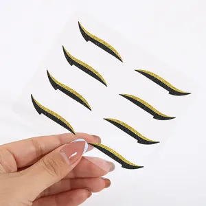 Self-adhesive black gold glitter eyeliner stickers for party stage eye makeup look.
