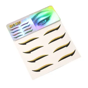 Glitter black and gold self-adhesive cat eye eyeliner stickers, detail view for party makeup.