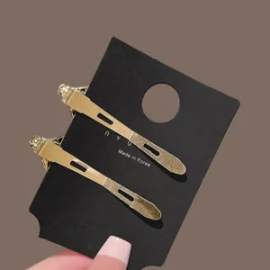 Elegant Korean style gold hairpin with sparkling rhinestones and feather design for women.