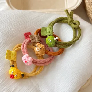 Leuke cartoon monster haarrekkers set, kleurrijke elastiekjes voor dames en meisjes accessoires.