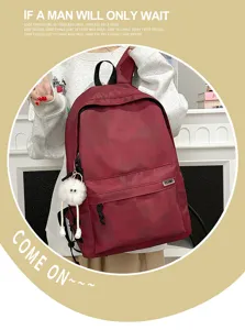 Detailed view of the stylish tie-dye canvas backpack with spacious compartments and cute pendant.