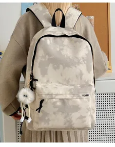 Casual tie-dye canvas school backpack with large capacity, ideal for students and daily commute use.