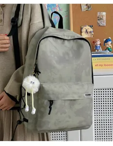 Casual tie-dye grey backpack for students with large capacity and cute pendant decoration.