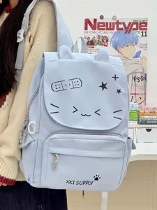 Vista dettagliata del simpatico zaino con orecchie di gatto, viso kawaii e tessuto blu resistente.