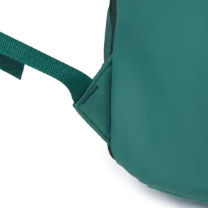Green casual backpack detail view, durable fabric material with strong strap stitching.