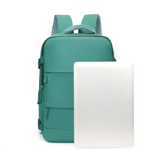 Green casual backpack detail showing multiple zipper pockets, spacious interior and laptop storage.