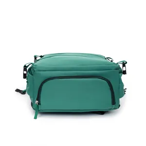 Green casual backpack detail view, minimalist travel school bag with front zipper pocket.