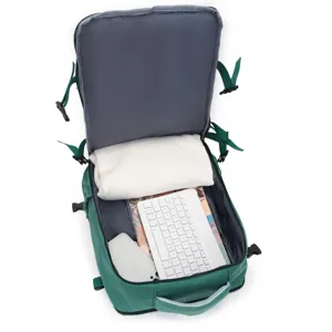 Green travel backpack interior detail showing spacious storage capacity and compartments.