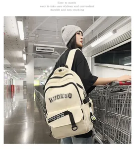 Retro canvas large capacity college style backpack for women student daily commuting use.