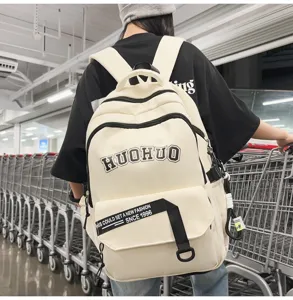 Vintage large capacity canvas backpack for women students, casual school bookbag with laptop room.