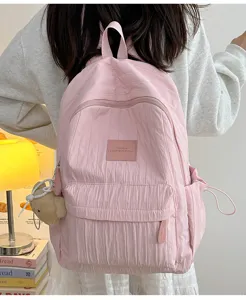 Pink lightweight pleated backpack detail, casual daily school book bag with cute bear pendant.