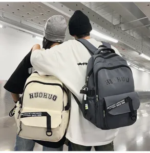 Retro versatile college style backpack for students, large capacity computer schoolbag.