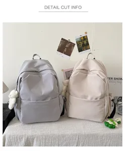 Casual solid color large capacity backpack for women and men, stylish school book bag.