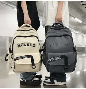 Retro college style large capacity casual backpack with stylish letter print and durable straps.