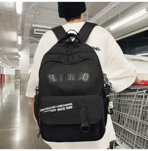 Casual black backpack with large capacity, retro student bookbag, ideal for daily use.