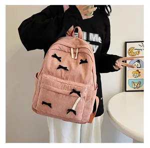 Japanese style pink corduroy backpack for women, cute bow design casual school daypack.