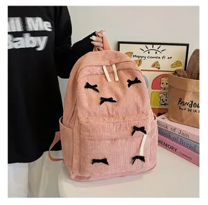 Japanese style cute corduroy backpack for women, retro pink school book bag with sweet bow.
