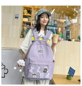 American minimalist large-capacity student backpack with letter patches for casual travel use