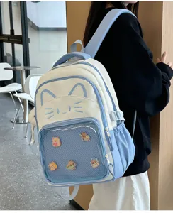 Cute Japanese style cat ear ita backpack with mesh front pocket for pins and large capacity.