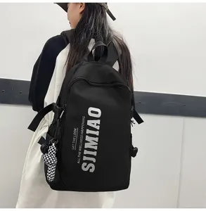 Stylish black backpack for students and travel with large capacity and modern design.