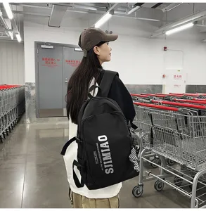 Detailed view of large capacity black backpack, stylish campus style for students daily use.