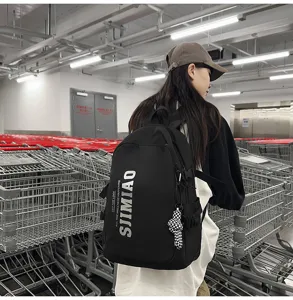 Large capacity black school backpack for high school students, casual laptop daypack detail.