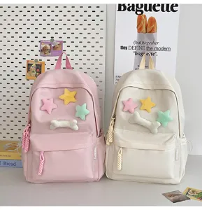 Minimalist student dual shoulder backpack with cute plush star and bone decorations details.