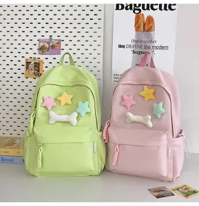 Cute aesthetic student backpack with plush star decor, casual Korean style casual school bag.