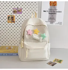 Minimalist casual canvas backpack for students, cute plush stars decor, versatile daily school bag.