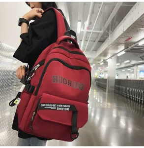 Retro college style large capacity canvas backpack for students, red laptop school bag.