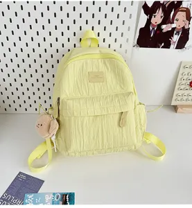 Lightweight solid color casual student school backpack for daily travel use now.