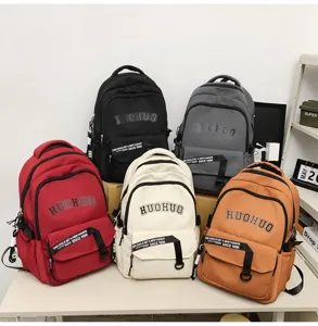 Multi-color casual canvas backpack for students, large capacity retro college style book bag.