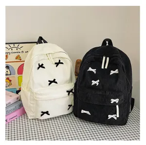 Japanese style corduroy backpack for women, cute bow design, casual school book bag daily use.