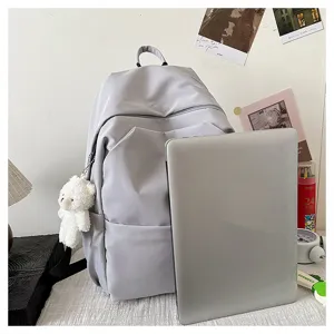Casual solid color large capacity backpack for students and travel, minimalist grey school bag.