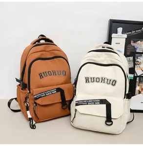Detailed view of the vintage college style canvas backpack, featuring large capacity and use.