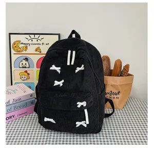 Japanese aesthetic black corduroy backpack with cute white bows for women and students daily use