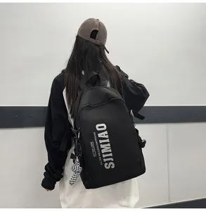 Large capacity black canvas backpack for school students and daily outdoor commute fashion style.