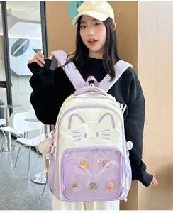 Cute cat ita backpack for women, college style clear pocket school bag for pins and daily casual use.