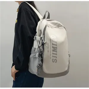 Large capacity casual backpack for students, stylish contrast color school bag with multi pockets.