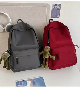 Large capacity minimalist solid color backpack for students, stylish everyday school bag.