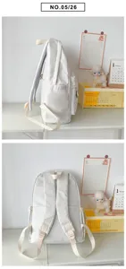 Minimalist white backpack, large capacity school bag, student casual travel daypack.