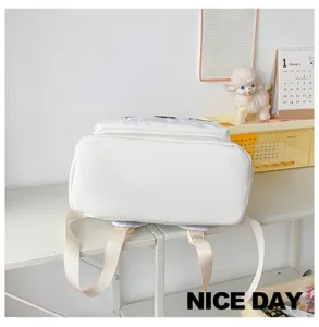 Minimalist large-capacity white letter backpack, stylish school bag for students and travel.