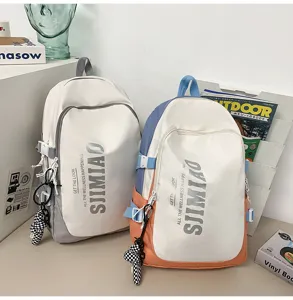 Large capacity student backpack, stylish casual school bag for daily commuting and laptop storage.