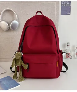 Minimalist red large capacity canvas backpack school bag for students and daily casual travel use