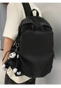Minimalist black canvas casual backpack for daily use, large capacity and stylish design.