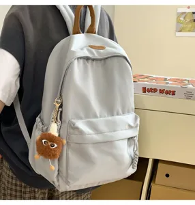 Korean style casual backpack for students grey school bag with cute plush toy pendant
