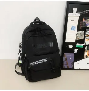 Classic retro black student backpack detail view, large capacity school bookbag for girls.