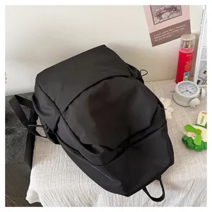 Black casual minimalist large capacity backpack detail view, durable fabric daily school bag.