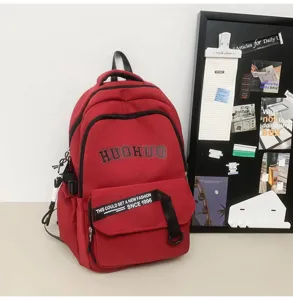 Classic red student backpack large capacity vintage bookbag versatile casual college daypack.