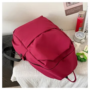 Versatile solid color large capacity backpack for casual daily use, school and travel.